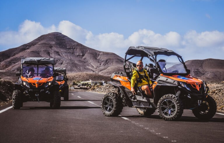 Buggy tour starting in Costa Calma with orange Z Force buggies lined up before departure